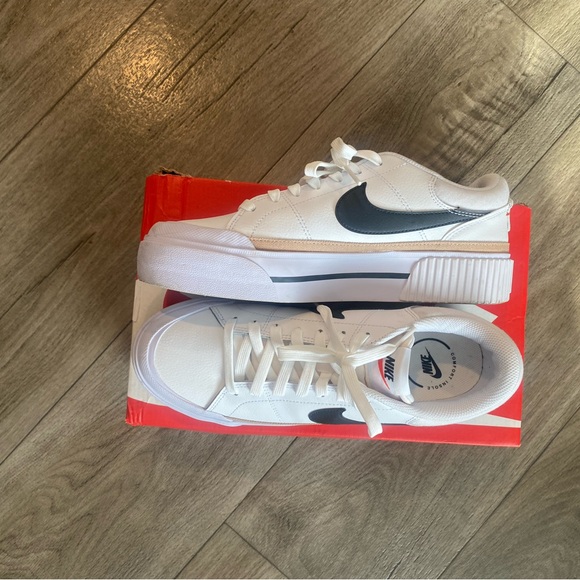 Nike Shoes - Nike Legacy Lift women’s White Sneakers with Black Swoosh